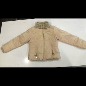 light yellow/ tan puffer jacket. soft lining inside of jacket. Very warm